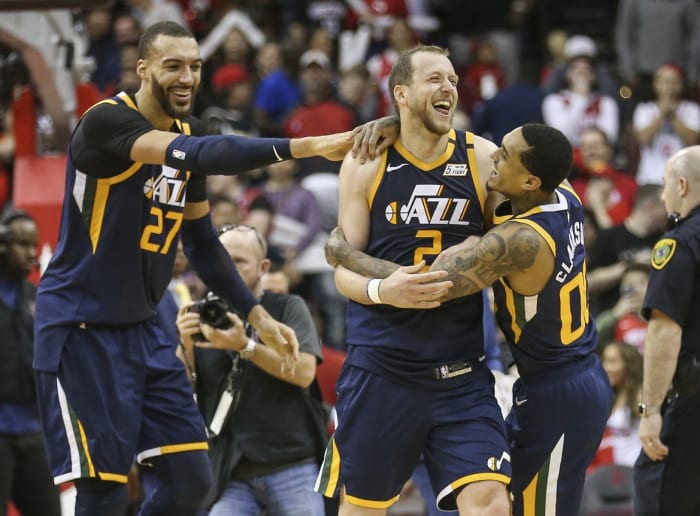 Jordan Clarkson (00) and Joe Ingles (2) celebrate in a win over the Houston Rockets